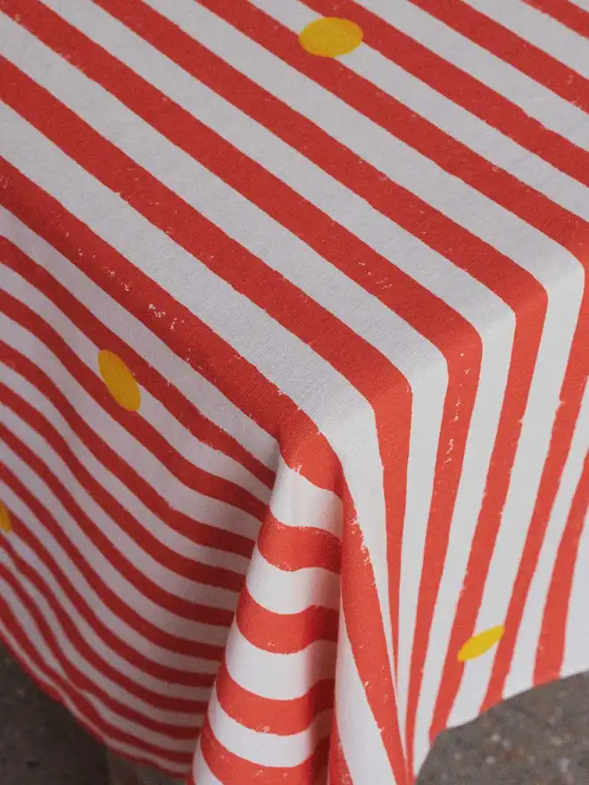 Red stripe and yellow dot tablecloth 