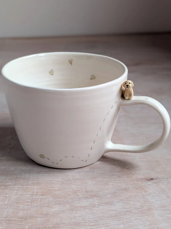 Caramel Cockapoo mug with bouncing tennis ball