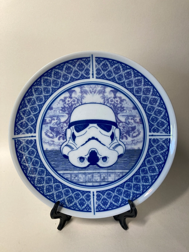 Delft style blue and white 8" plate featuring a Stormtrooper head in the centre