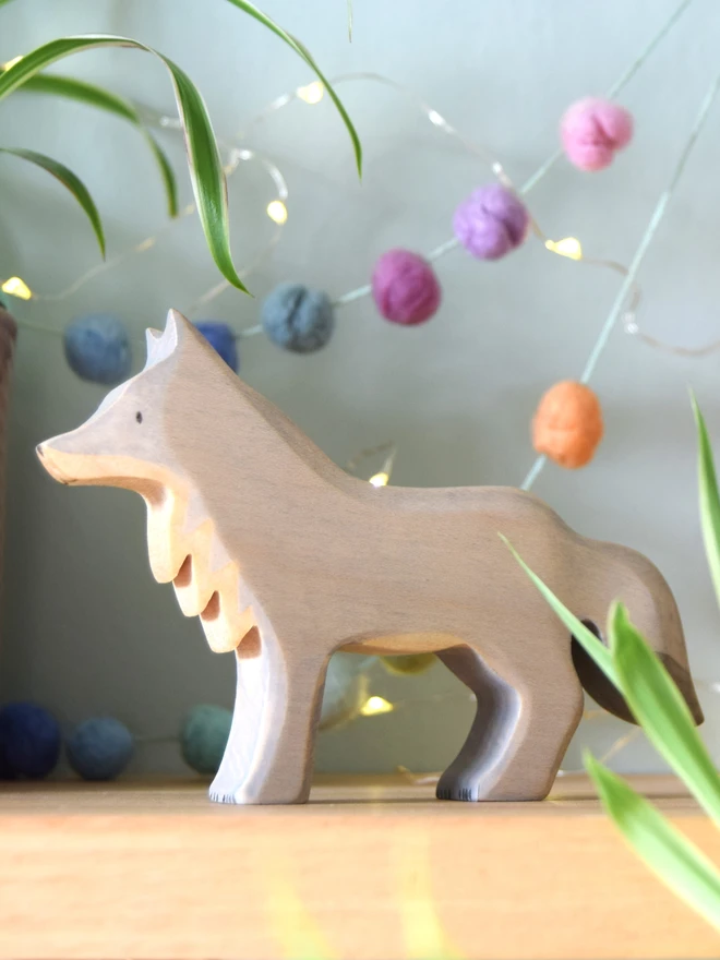 wooden standing wolf toy made by eric and albert