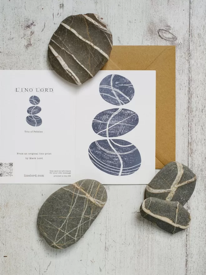 Greeting Card with an image of a Trio of Pebbles, taken from an original lino print