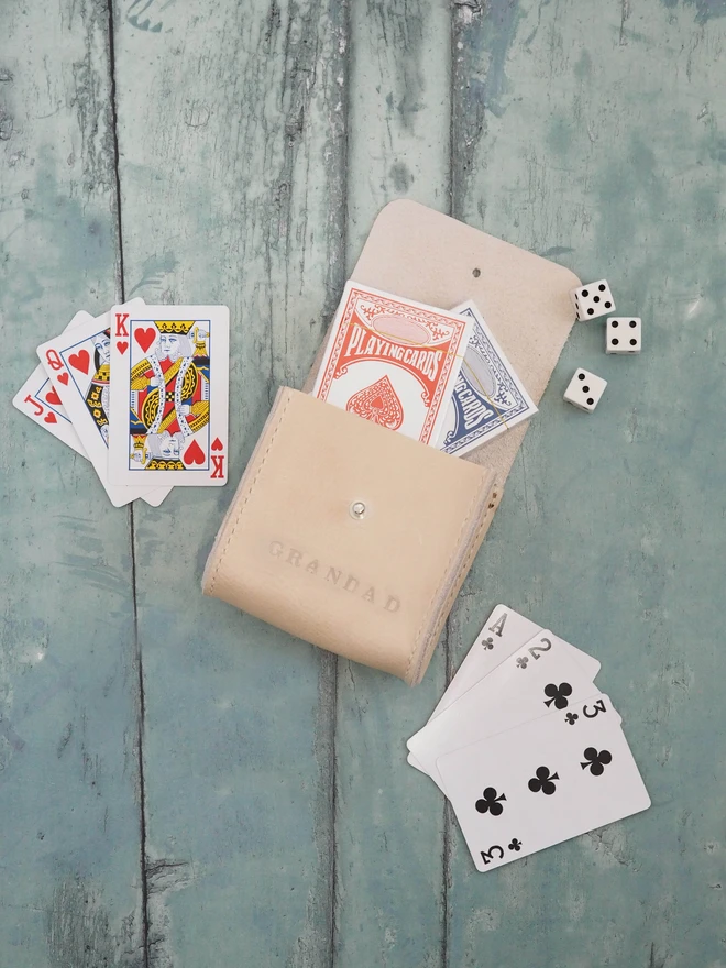 Personalised Leather Playing Card and Dice Holder. Natural cream leather case, carrying two decks of playing cards and 6 dice.