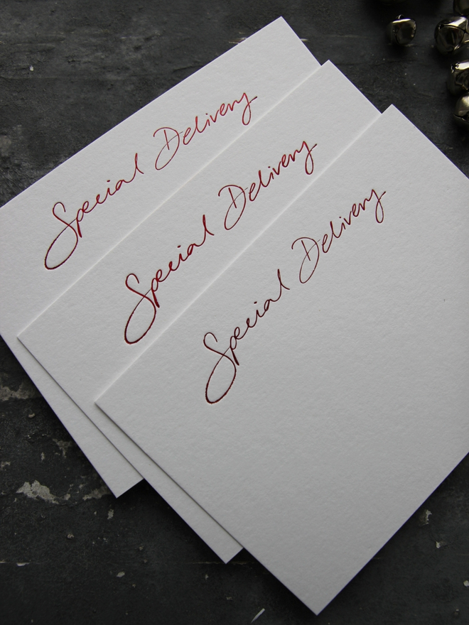 christmas notecard with Special Delivery in red foil comes with envelope which says North Pole Mail