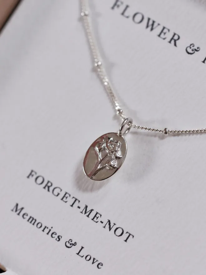 Forget me not flower charm necklace