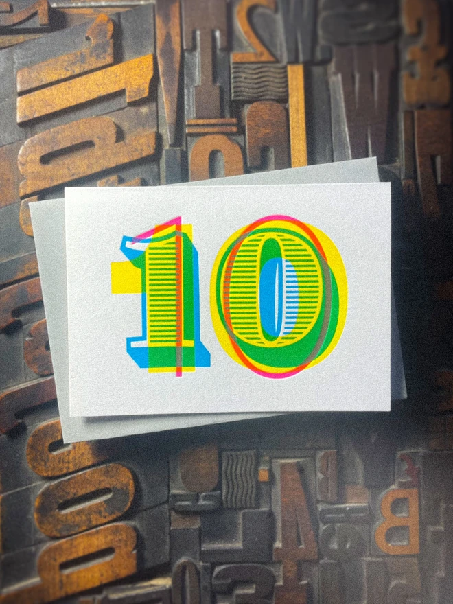 10th birthday anniversary typographic letterpress card. Deep impression print. Unique with no print being the same. They show slight colour variations adding to the style. Also available in other milestones : 1, 2, 3, 18, 21, 30, 40, 50, 60, 70, 80.