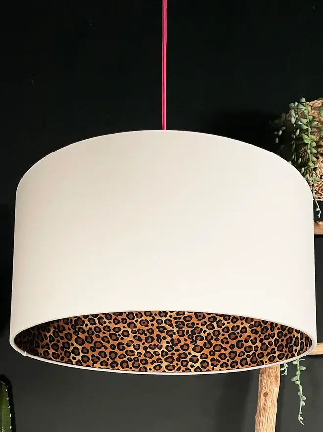 Wild Leopard Silhouette Lampshade In Crisp White Cotton, hanging. 