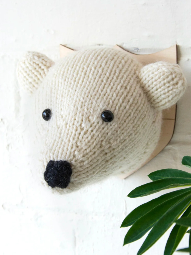 Bear Head Knit Kit. A giant polar bear head, completed and mounted.