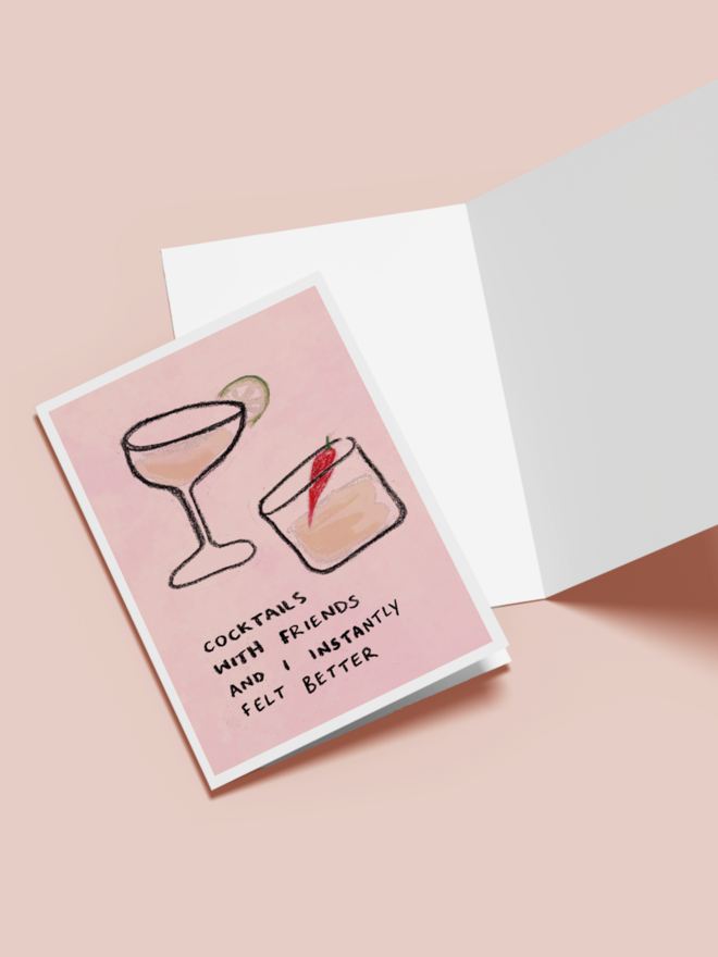 'cocktails with friends' card. a pink card with illustrated cocktails.