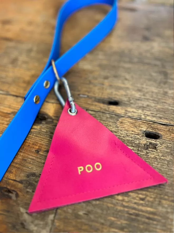 pink feminine poo pouch for dogs