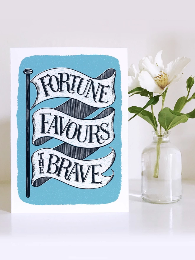 fortune favours the brave card with white flower in small vase