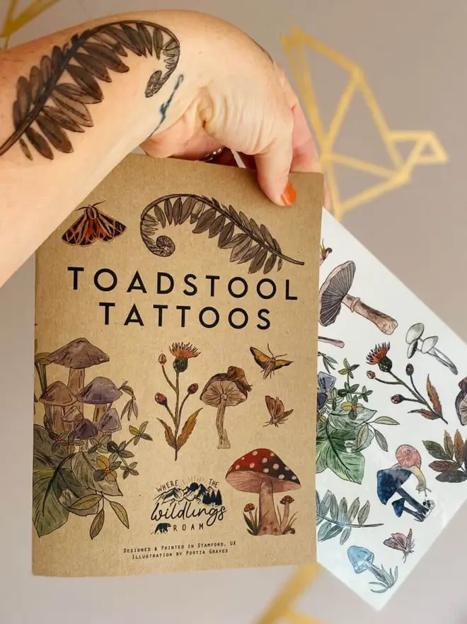 Nature Botanical Temporary Tattoos,  a brown kraft paper booklet titled "TOADSTOOL TATTOOS" featuring various colourful botanical illustrations. 