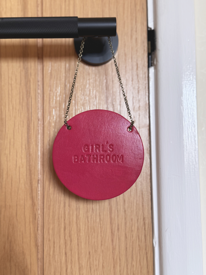 magenta leather door hanger for bathroom sign