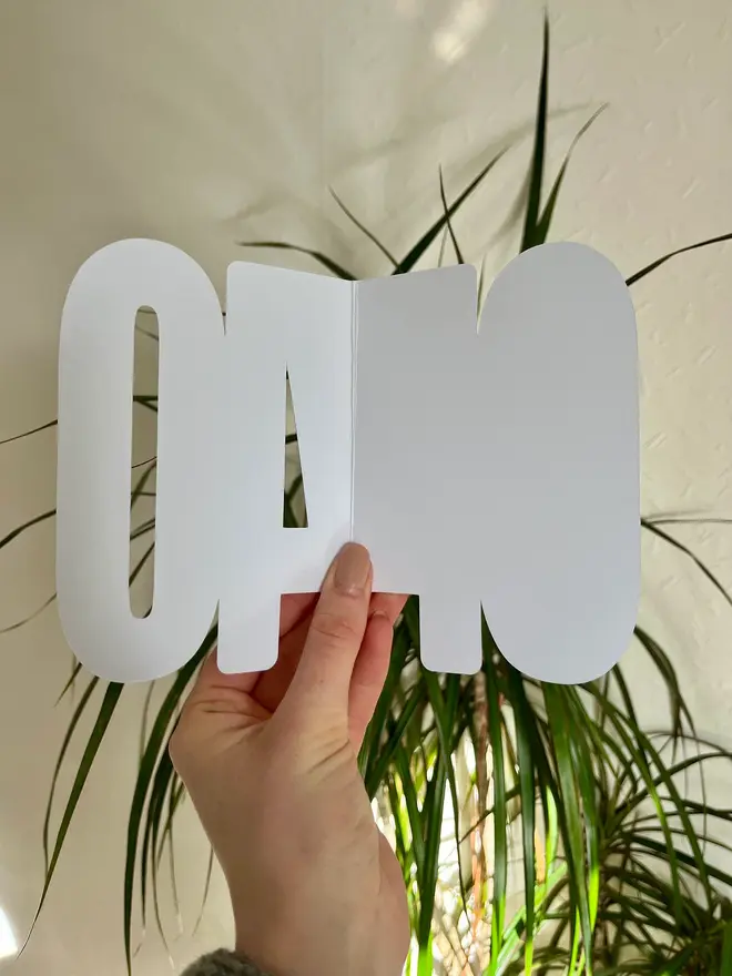 floral 40th birthday card. card shaped like 40 open to show blank inside.