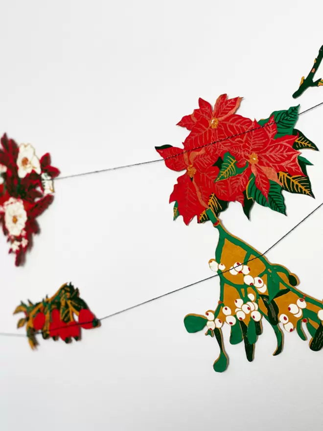 Christmas garland hanging over wall