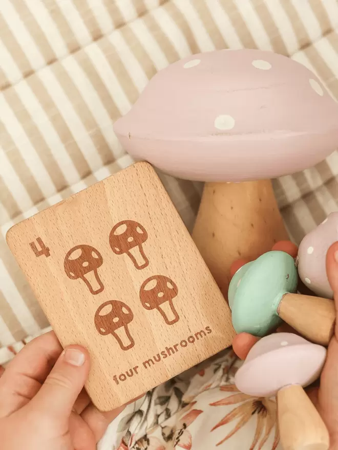 Wooden Nature Flashcard with Four Mushrooms