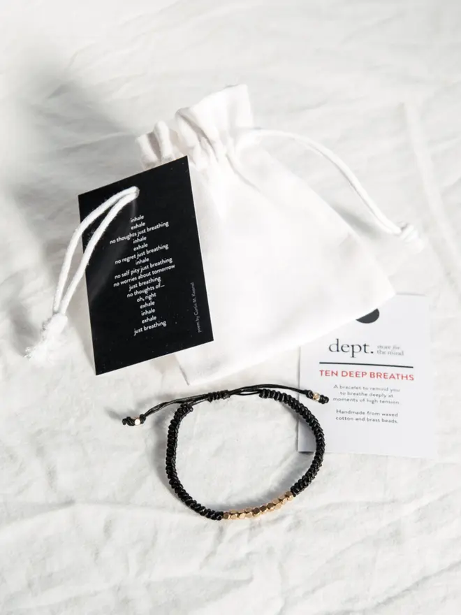 Ten Deep Breaths Bracelet in black with Drawstring Bag