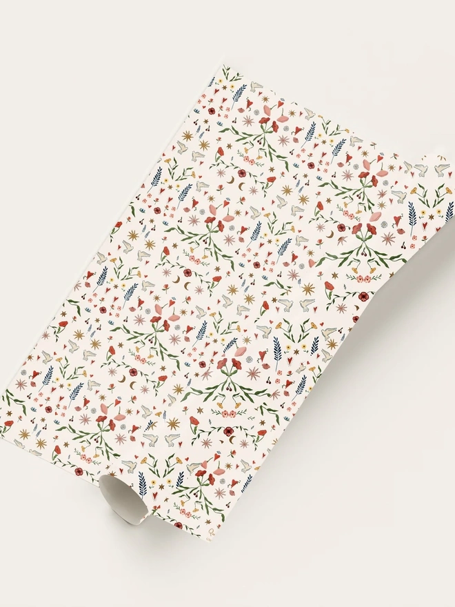 Folk Love Gift Wrap (3 Sheets), a gift wrap sitting on a plain white surface. 