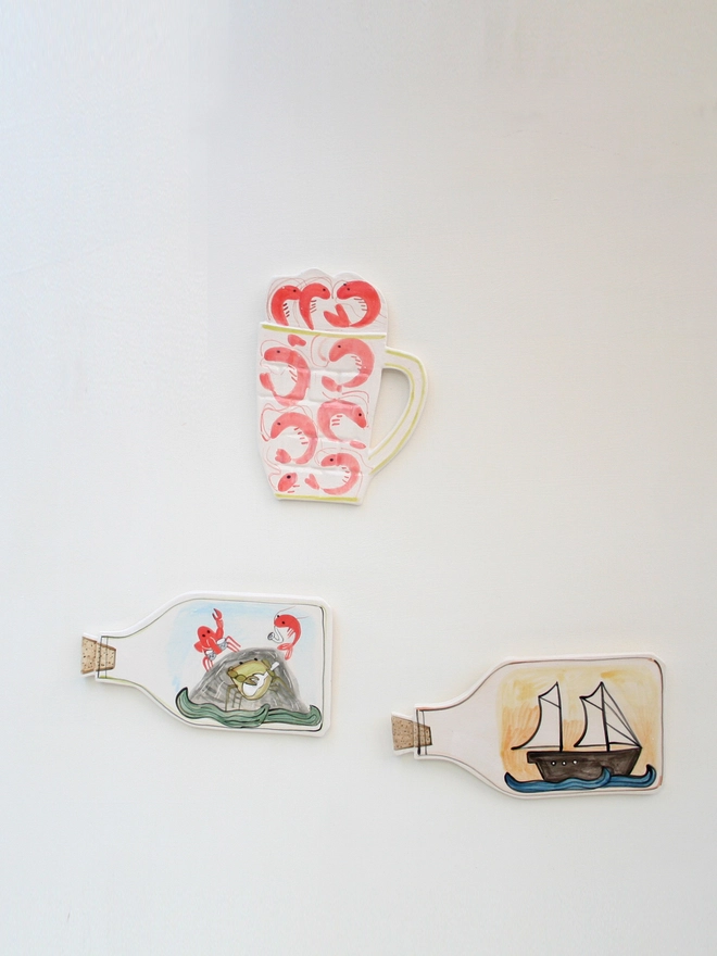 handmade ceramic wall art, seaside, ship in bottle, prawns, ceramic prawns, ceramic, crab band, wall hanging, fun ceramics