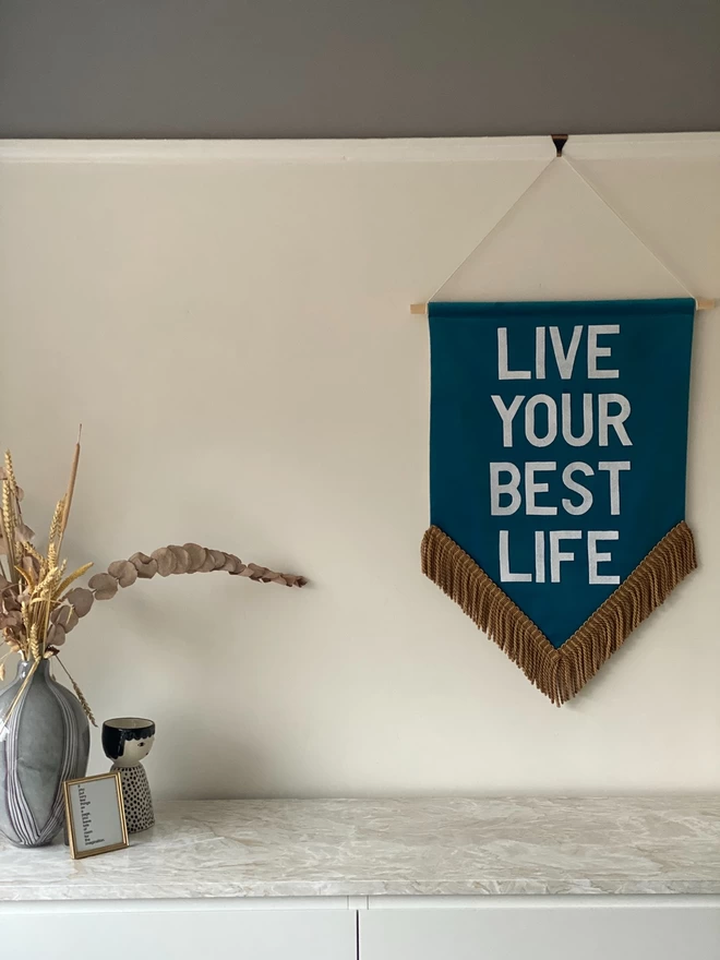 live your  best life colourful wall hanging
