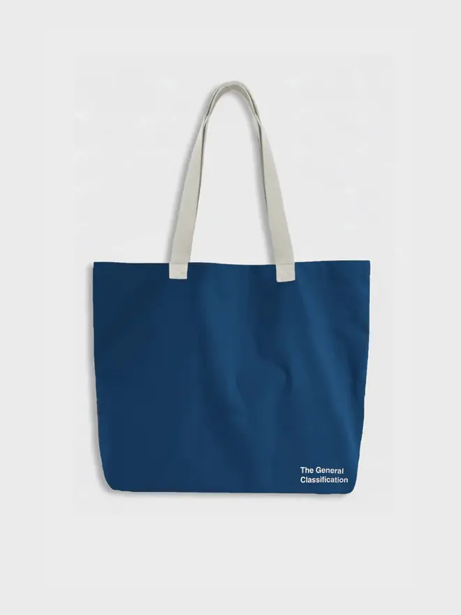 'Chaos' Tote Bag, against a grey background. 