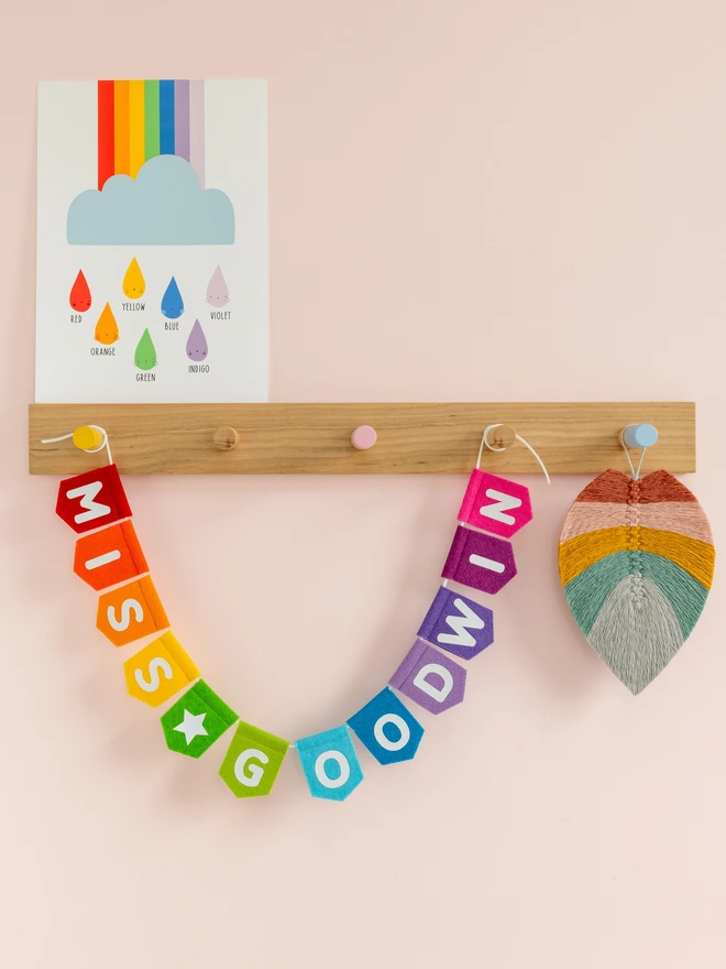 rainbow bunting with a teachers name on it.