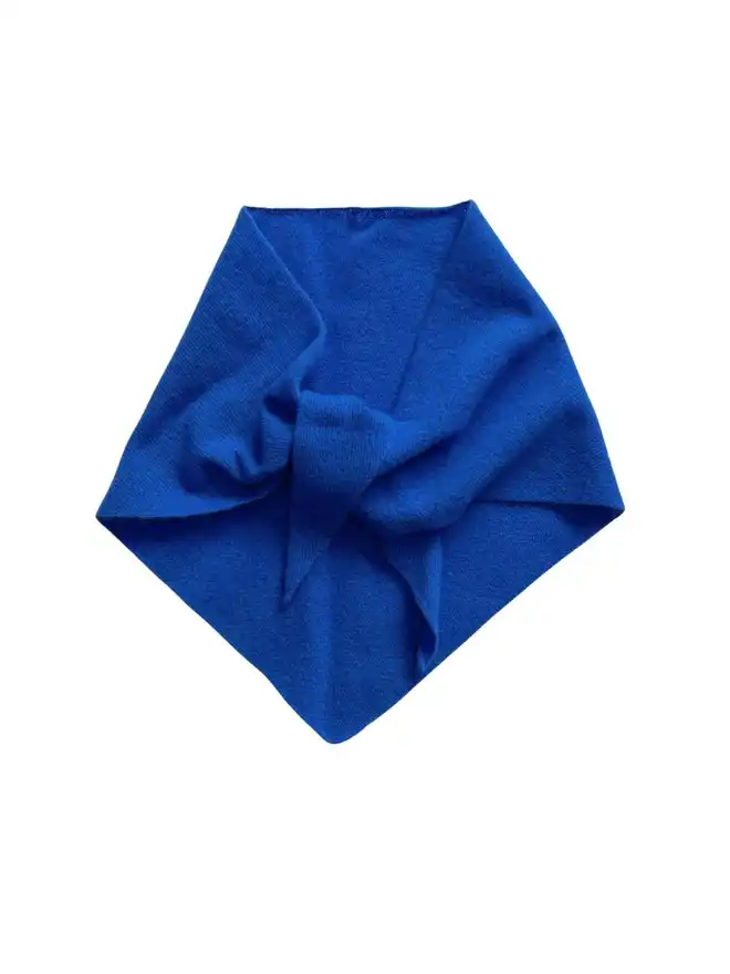 Cobalt blue triangle scarf shown from above on white background