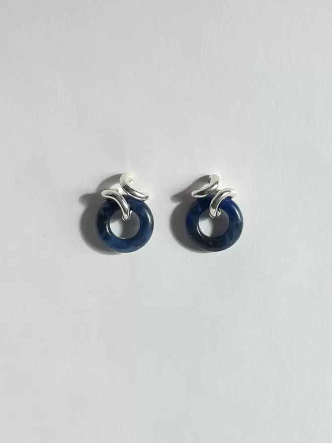 solid sterling silver and blue crystal sodalite hoop earrings with a twisted design