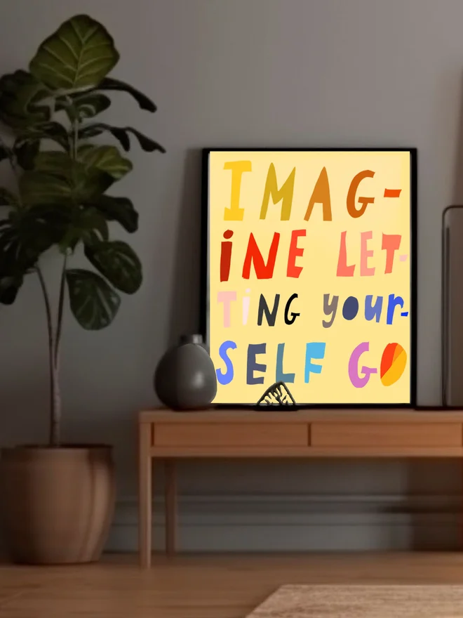 Imagine letting yourself go, in frame on table