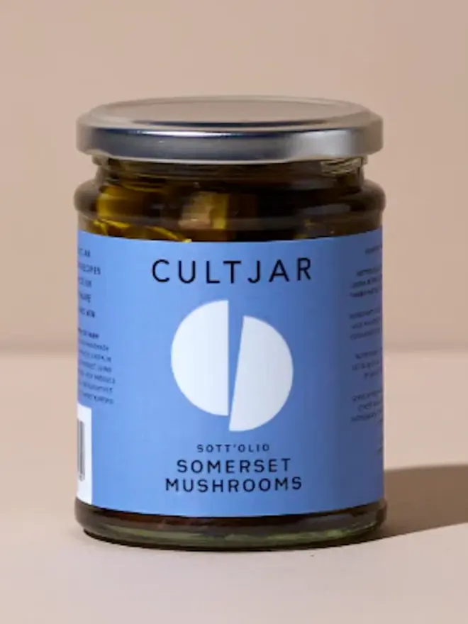 jar of mushrooms with blue label