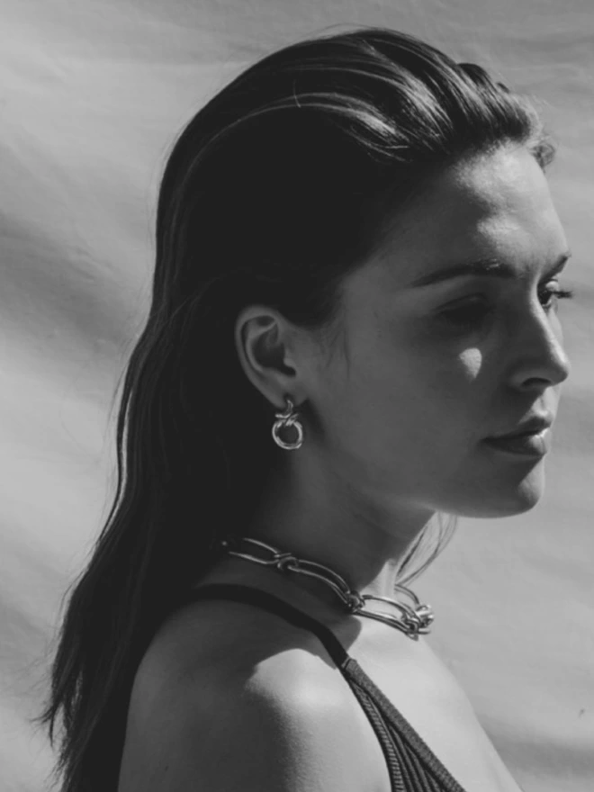 chunky silver chain and hoop earrings 