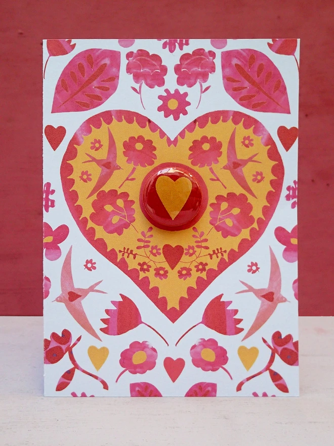 heart design greeting card with pin badge