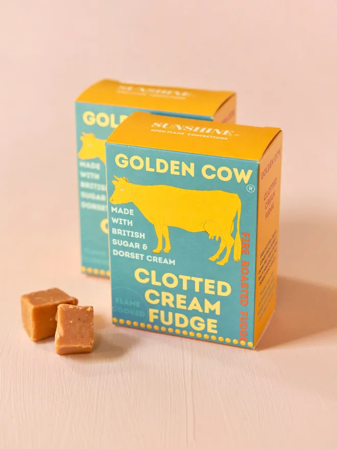 blue and yellow box of fudge with yellow cow