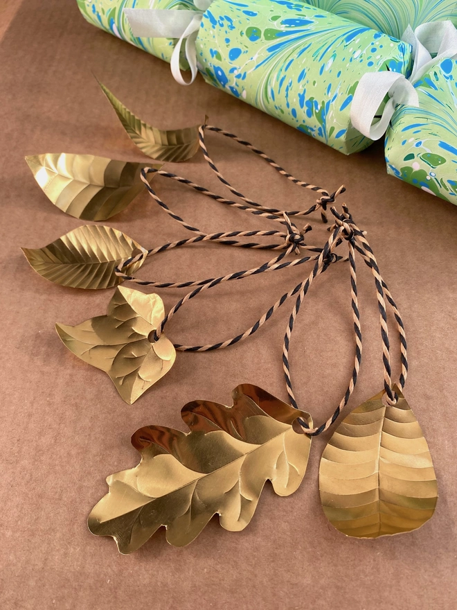 Handmade and embossed brass leaf decorations