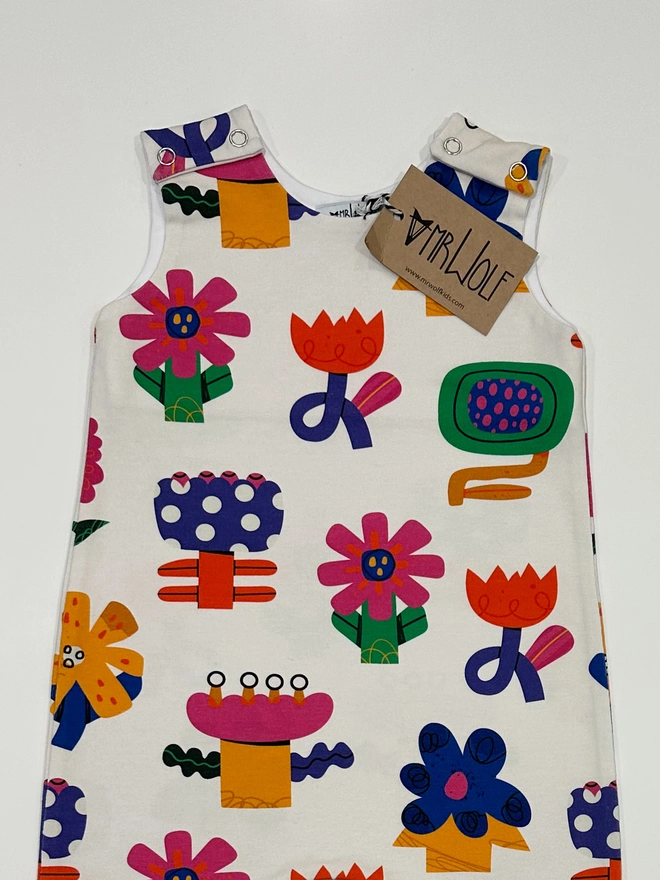 Baby romper in collage flower print fun baby romper colourful and bright