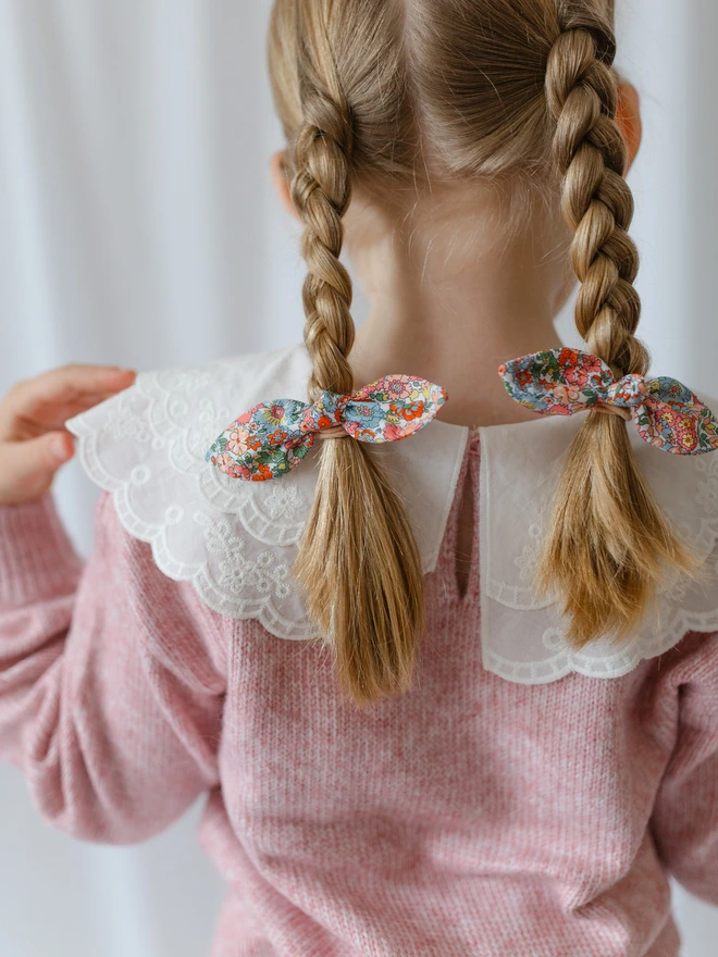 Liberty hair Bobble set on little girl with plaits