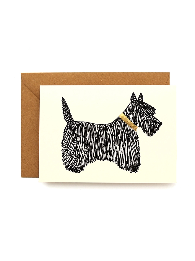 Greeting card featuring a scottie dog wearing a gold collar