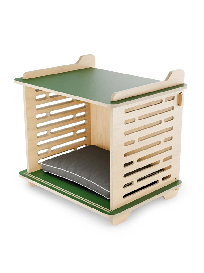 wooden dog crate with green top and base side view interior with cushion