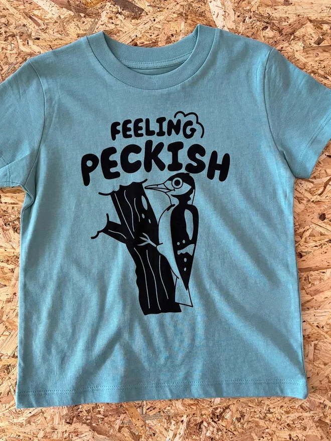 Feeling Peckish Bird Kids T-shirt by hello DODO