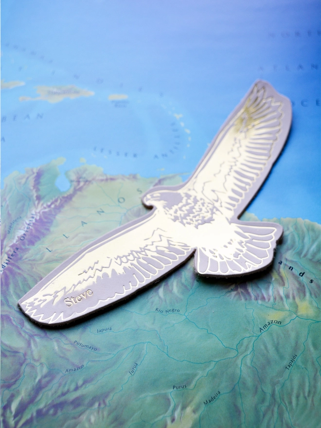 a natural cream leather eagle bookmark in gold detailing embossed onto vegetable tanned leather by natthakur