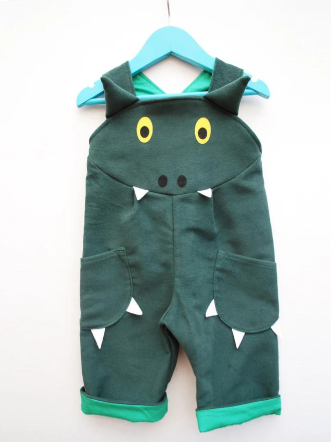 kids' green dragon dungarees front