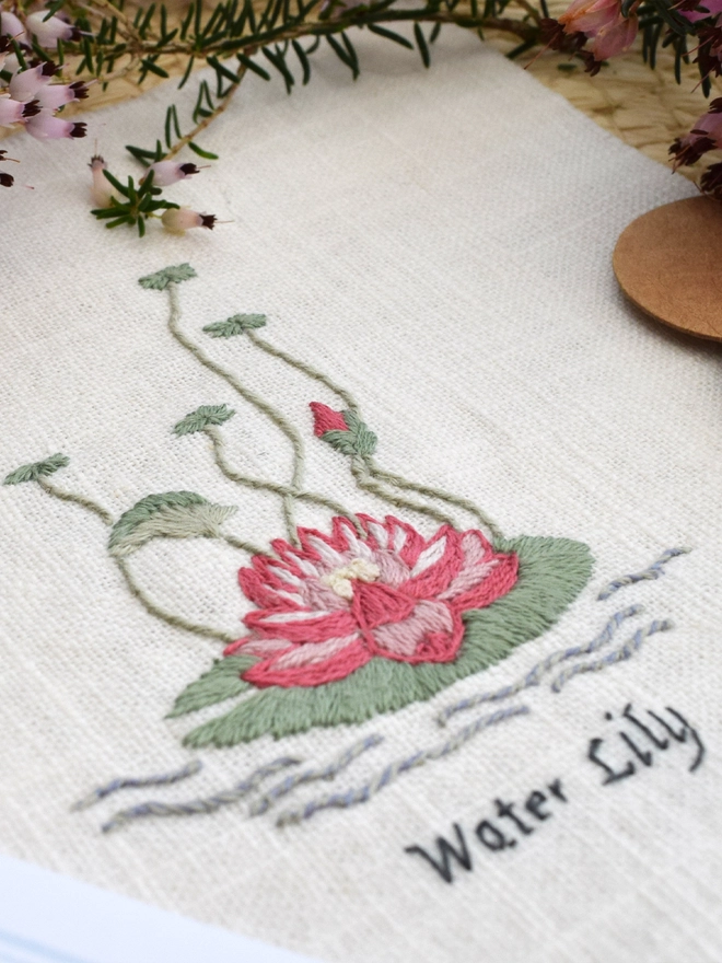 Floral Botanical embroidery kit of a pink Water Lily or Nymphaeaceae a symbol for July.  Meaning Purity of heart, Enlightenment, Harmony and Creation.