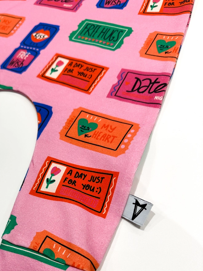 Valentines baby romper in love tokens print fun baby romper colourful and bright