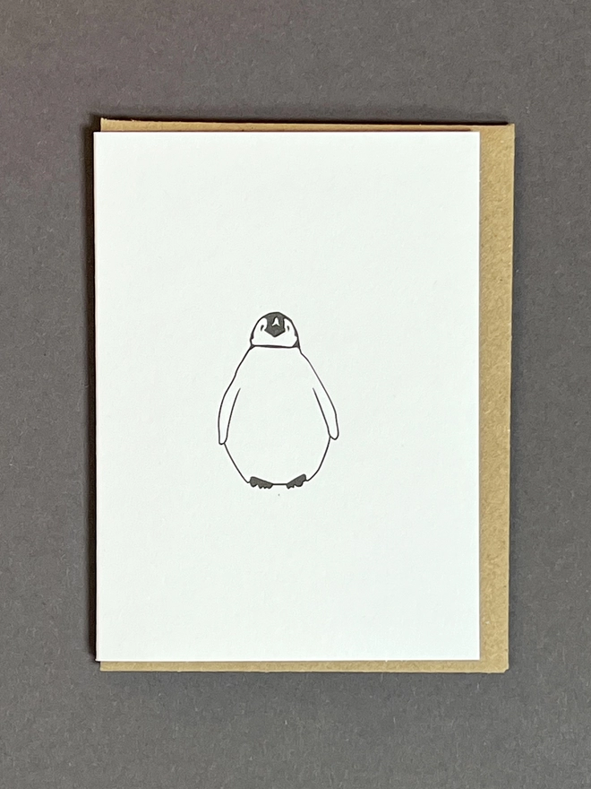 The very cute Baby up penguin on a small card