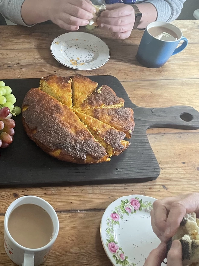 Large Charred Black Serving Board With Tasty Food