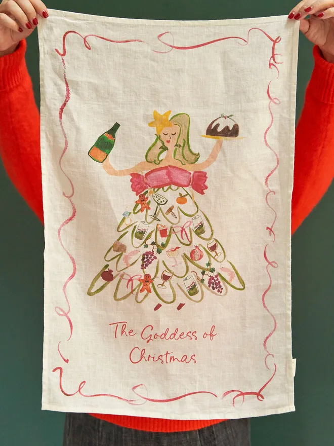 The goddess of Christmas linen tea towel