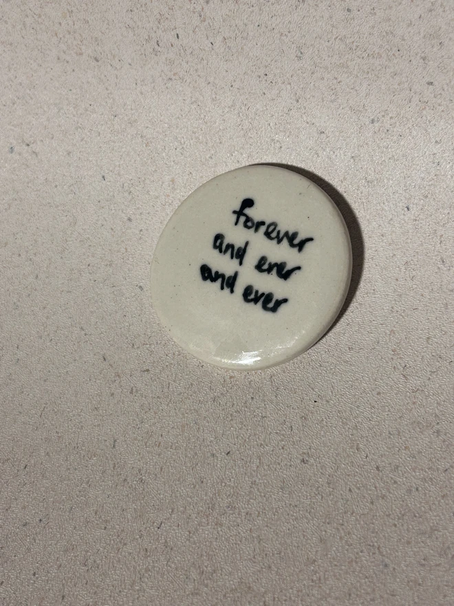 Love token saying 'forever and ever and ever'