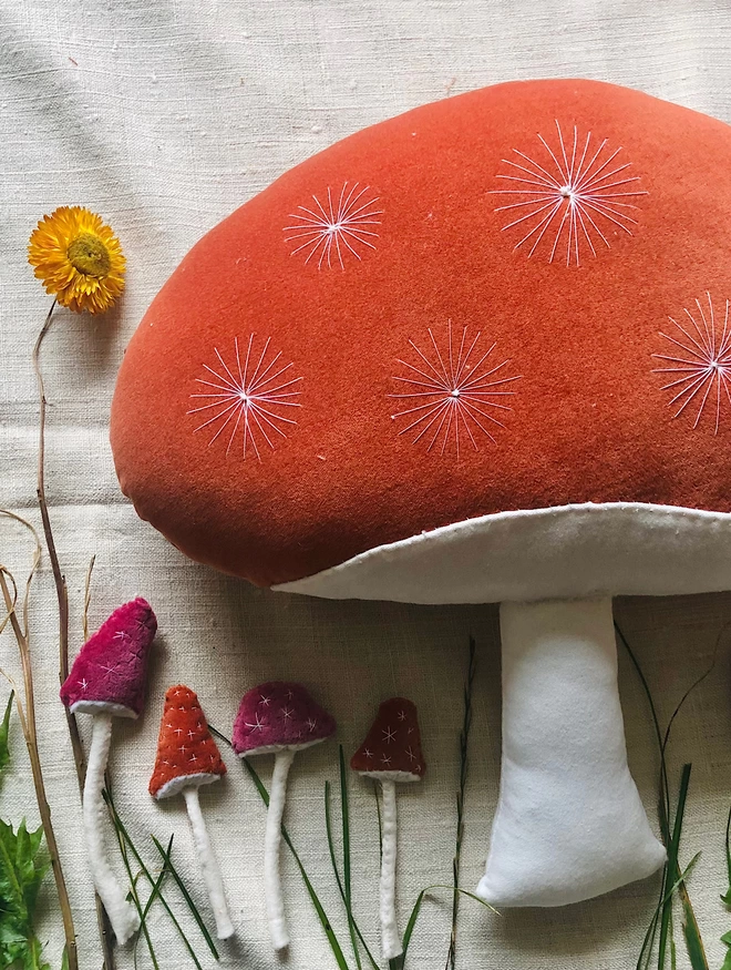 Rust coloured mushroom cushion 