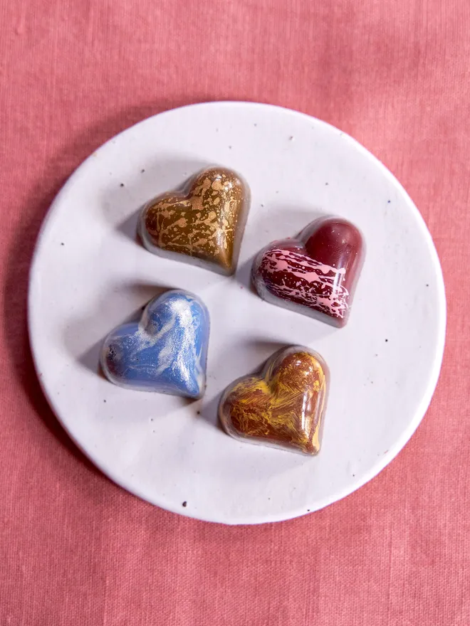 Set of four heart chocolates for Valentine's Day. 