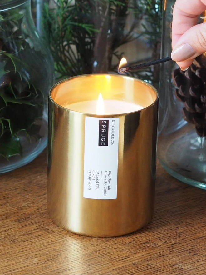 Spruce gold tin Christmas scented candle