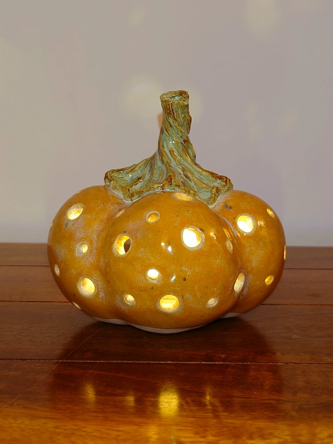 Pumpkin candle holder